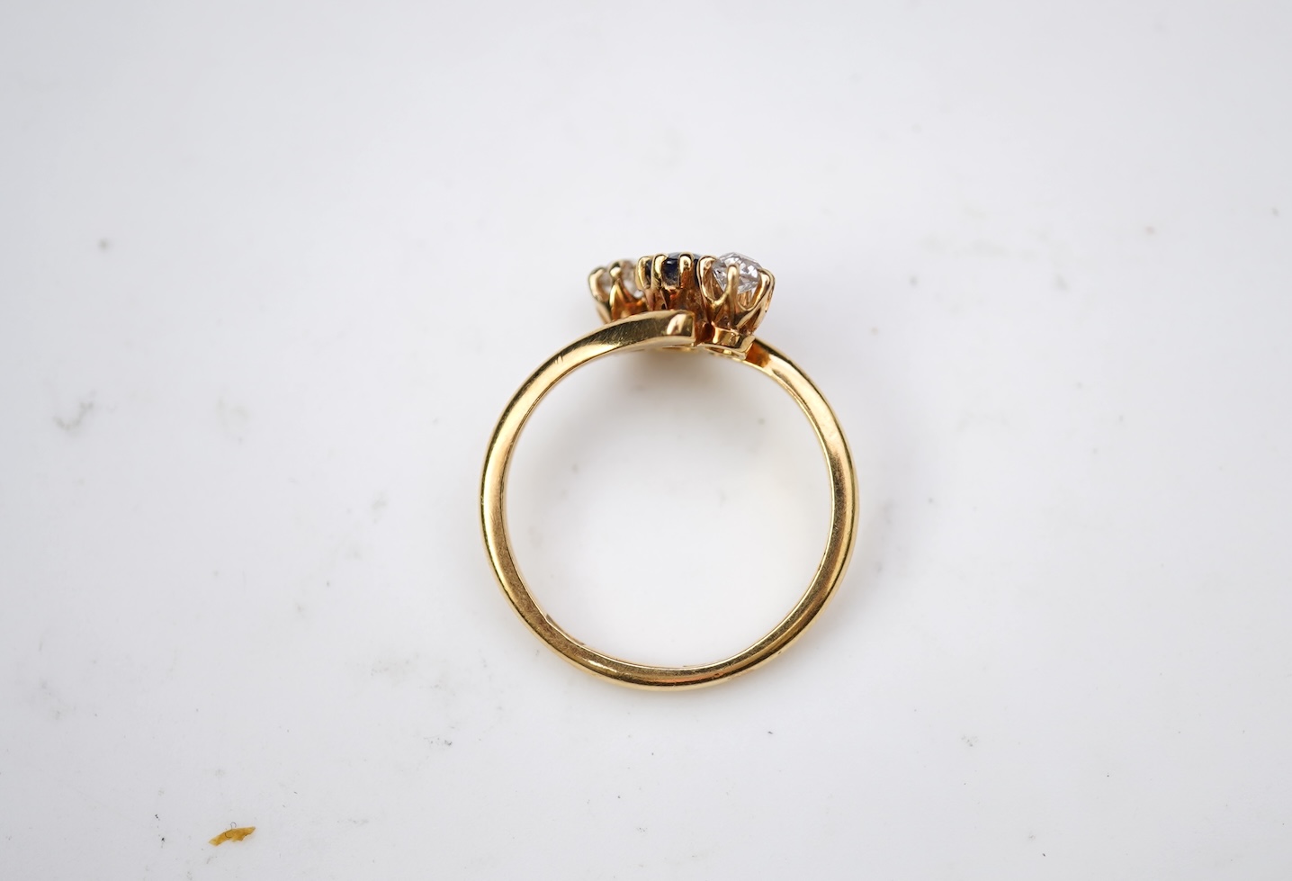 A sapphire and diamond three-stone ring, early 20th century